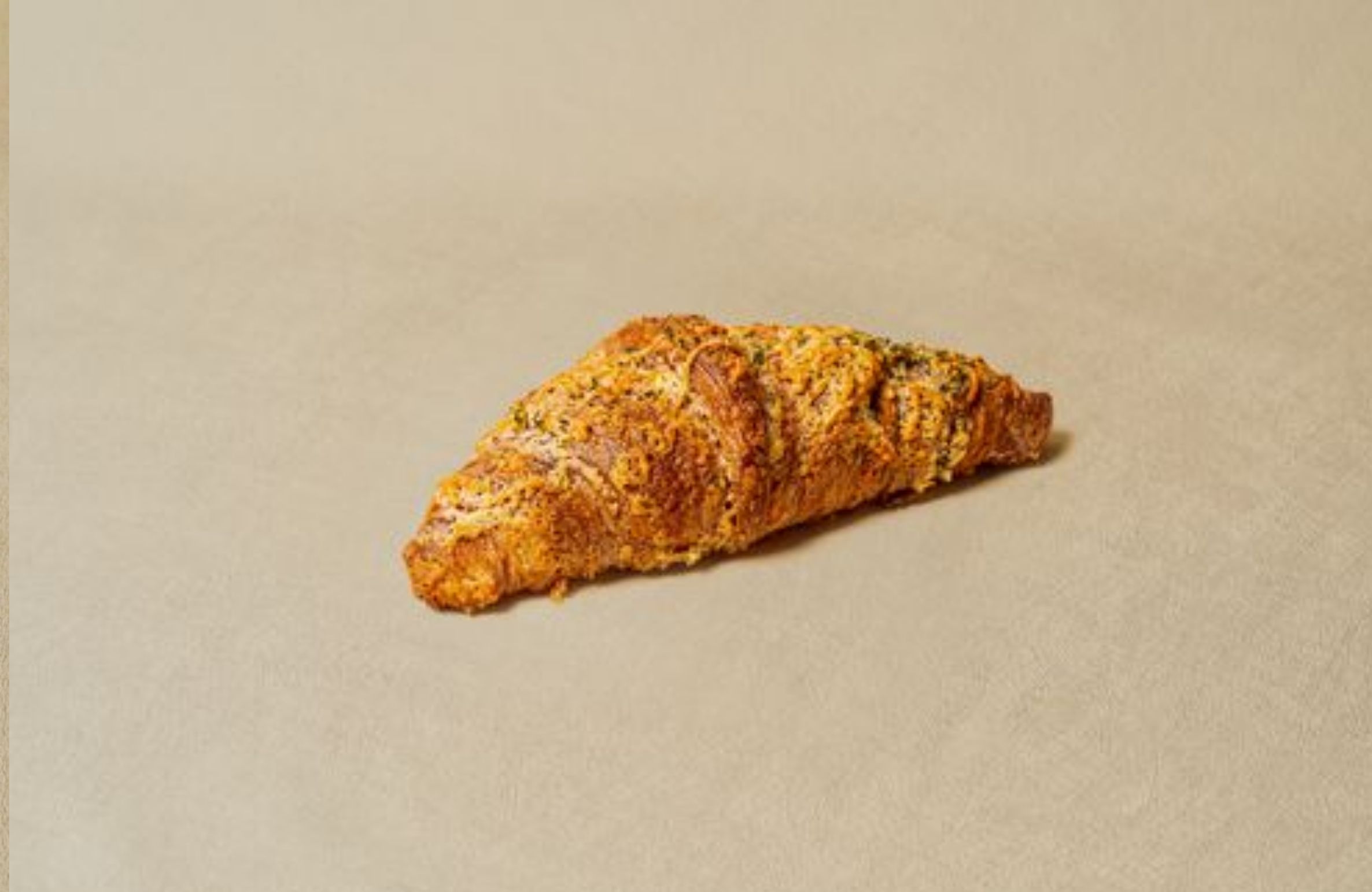 Perfectly extracted coffee paired with a croissant sandwich